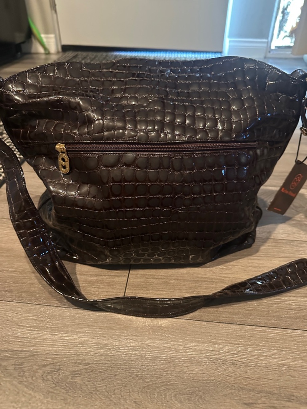 Marino Orlando dark chocolate patent leather embossed bag.
